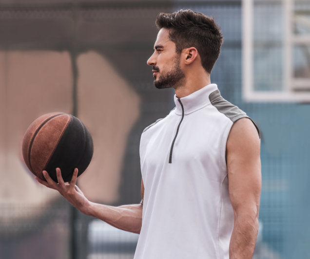 an athlete holding a ball